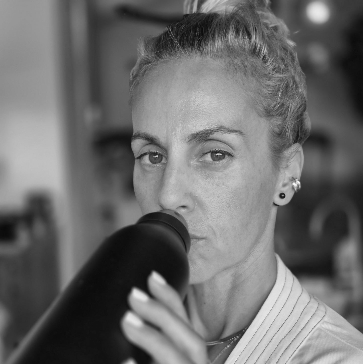 Janet drinking from a Yah Cha flask